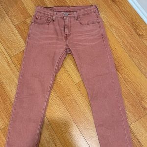 pink mid-rise levi’s denim
